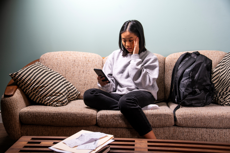 A university student of asian heritage experiencing stress