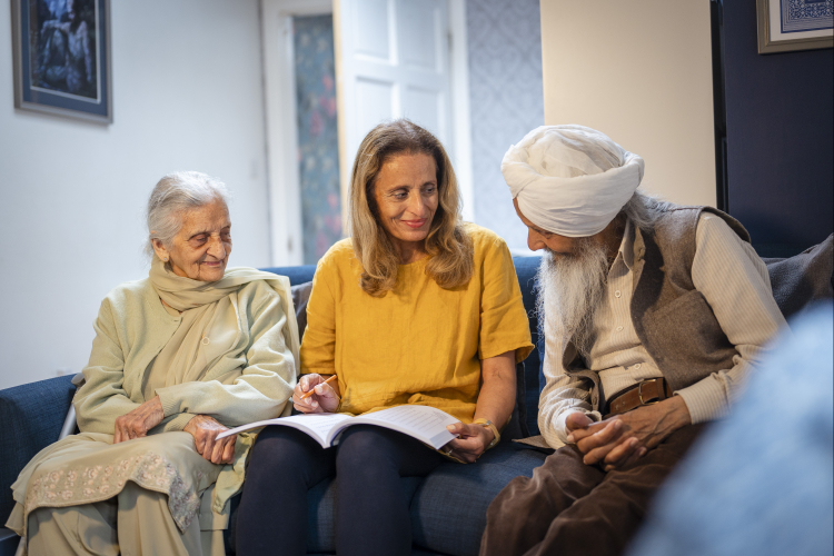 lady talking to couple