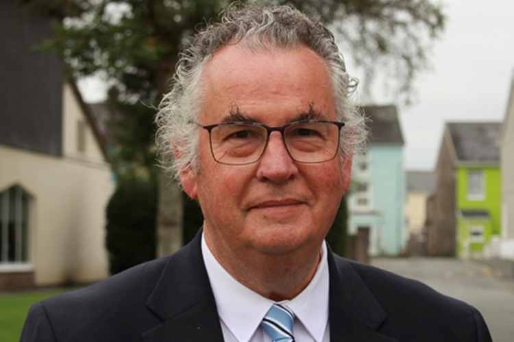 a photograph of Professor Medwin Hughes