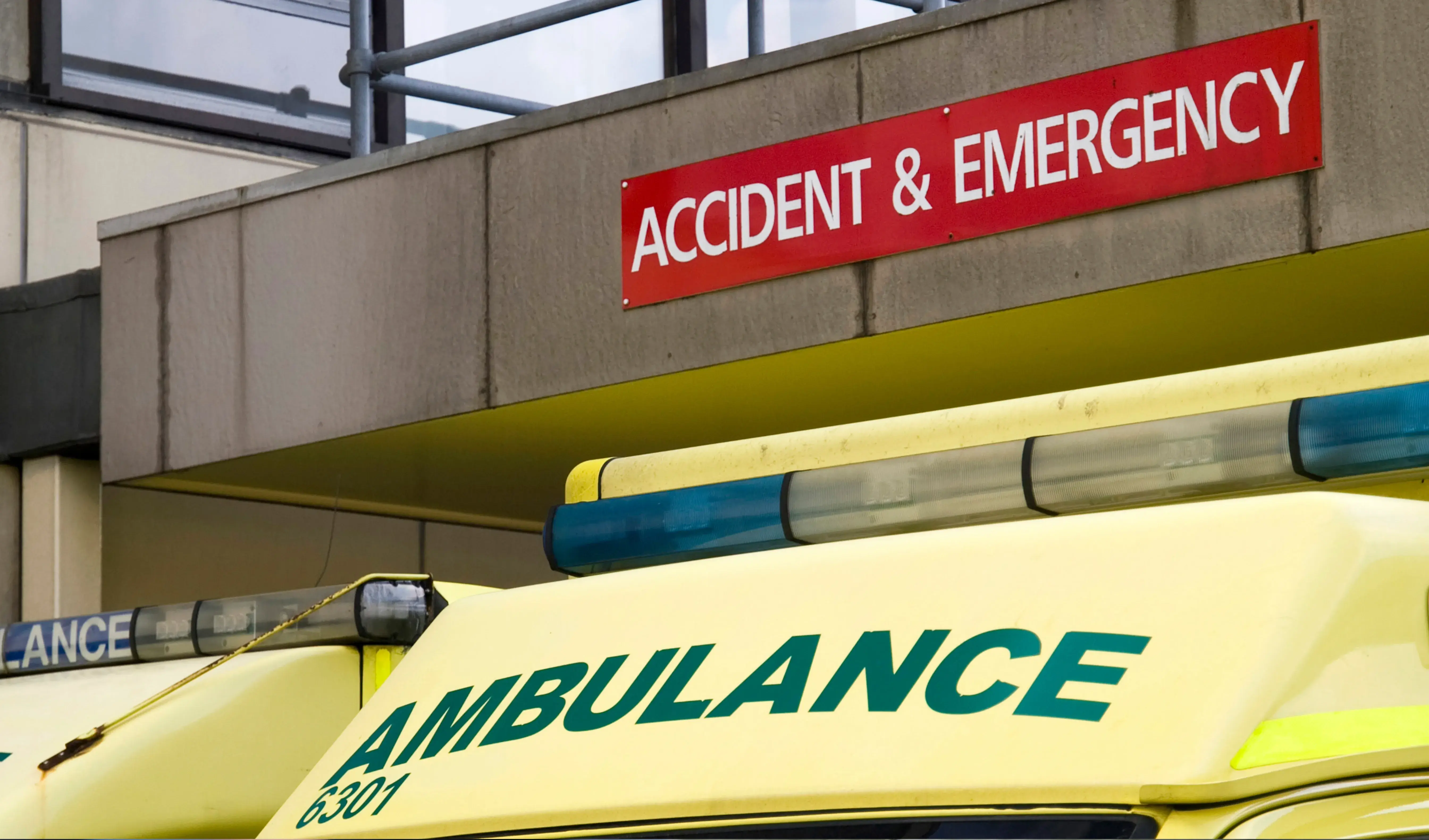 ambulance parked outside A&E building